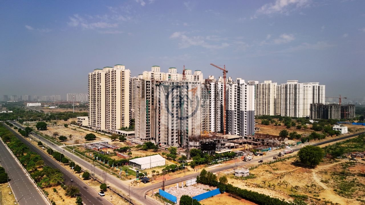 Sikka Kaamya Greens - Developer Background